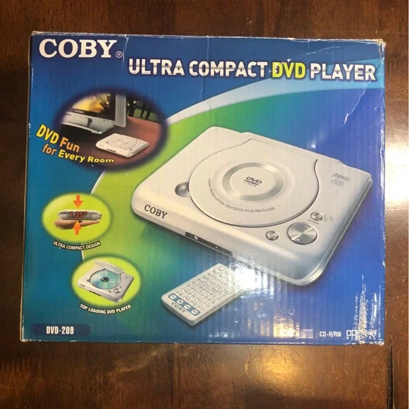 Coby DVD Player Ultra Compact DVD 209 Top Loading With Remote Control - Av Cable
